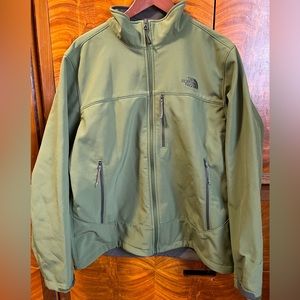 Green North Face zip-up men’s jacket